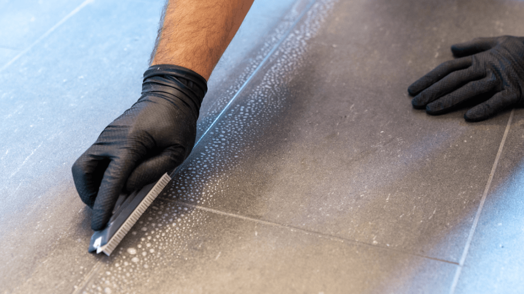 A professional cleaning tile and grout with headline "Cost to Professionally Clean Tile and Grout."